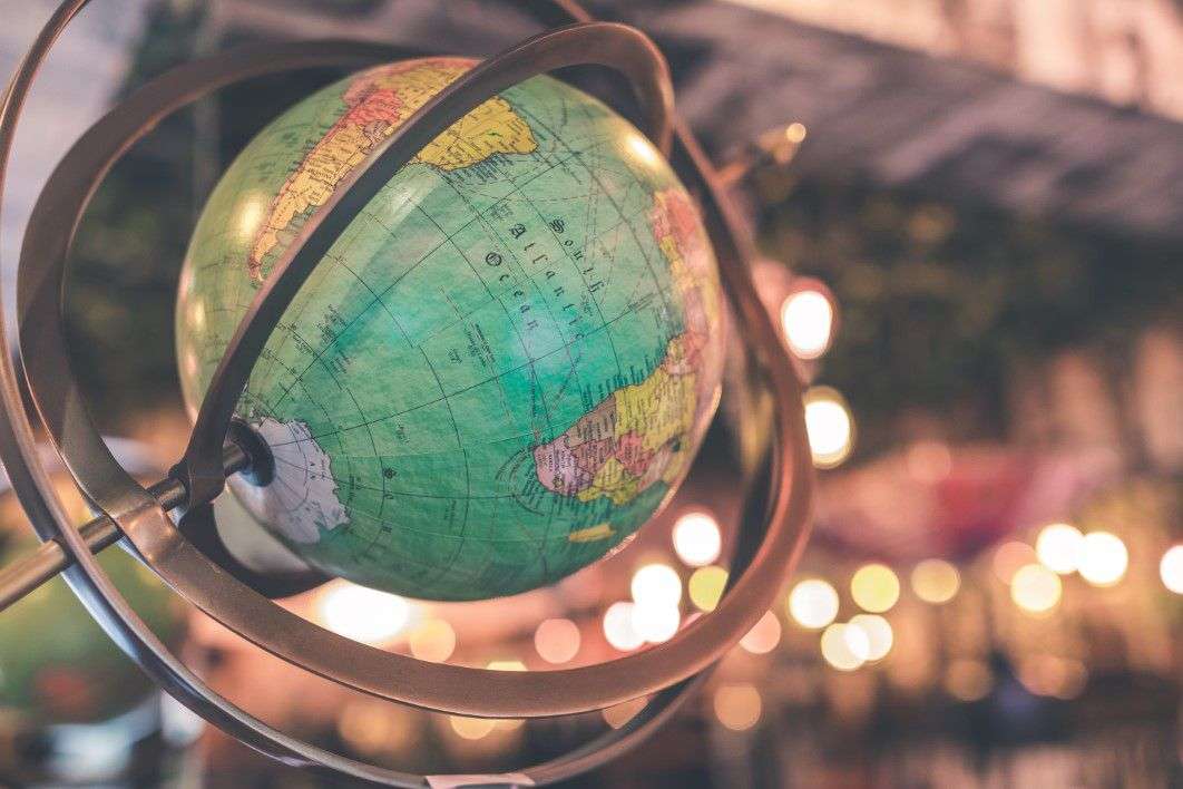 Negative Space Vintage Globe World Map Bokeh Artem Bali Thumb 1